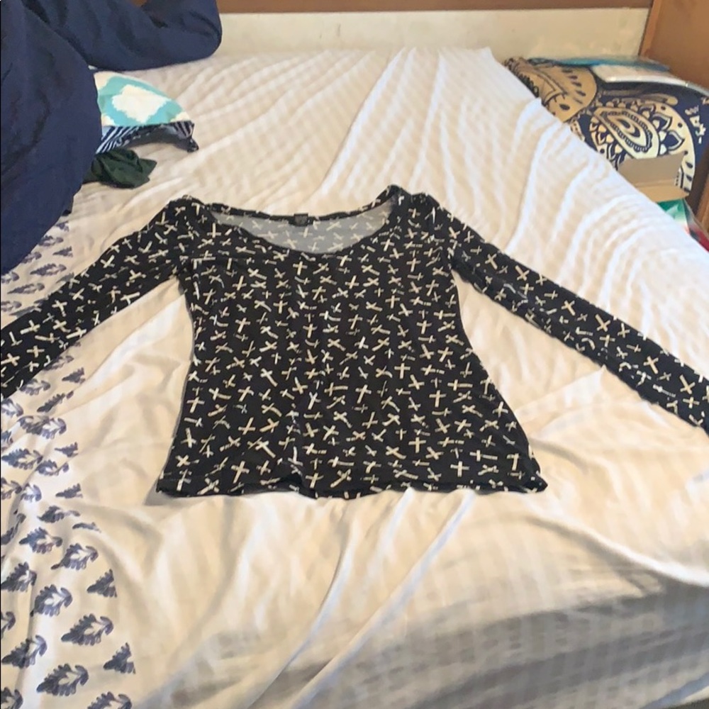 black shirt with white crosses